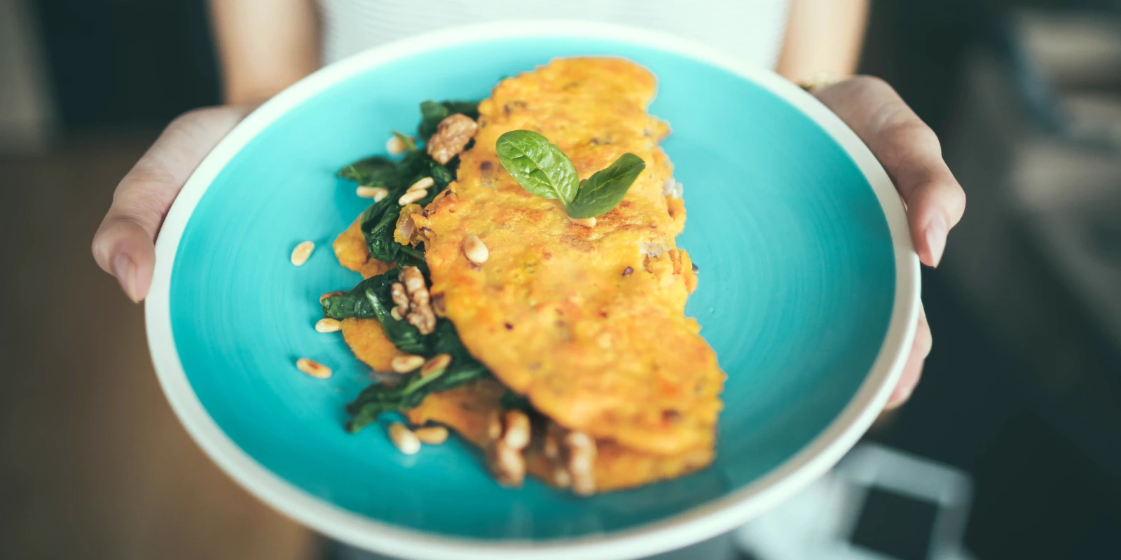 A runny Spanish potato omelette sliced on a tavern bar in Madrid